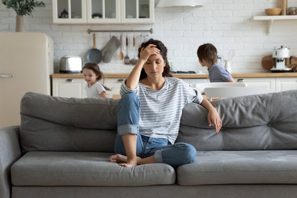 Stressed Out? Try These Healthy Tips to Chill Out 4 Young tired mother suffers from headache